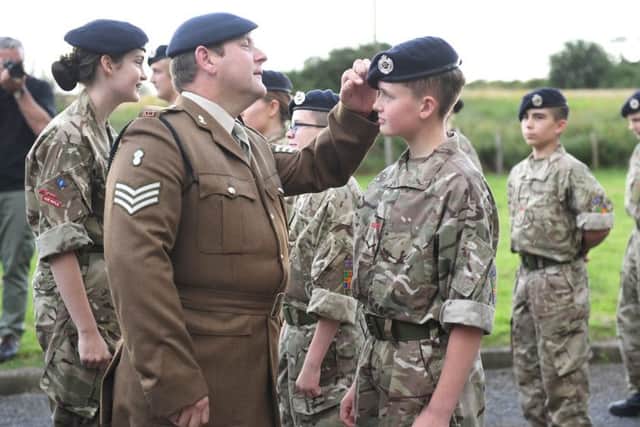 Billingborough cadets demonstrate their first aid skills to parents. Sgt Steve Walker inspecting the parade, pictured talking to L/Cpl Jack Loveridge. EMN-170731-180151001