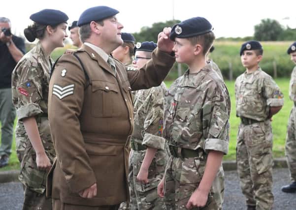 Billingborough cadets demonstrate their first aid skills to parents. Sgt Steve Walker inspecting the parade, pictured talking to L/Cpl Jack Loveridge. EMN-170731-180151001