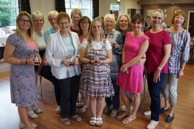 Show winners: Rollings Scones won three of the six cups on offer - Flowers, Cookery and shared the Produce Cup EMN-170108-070951001