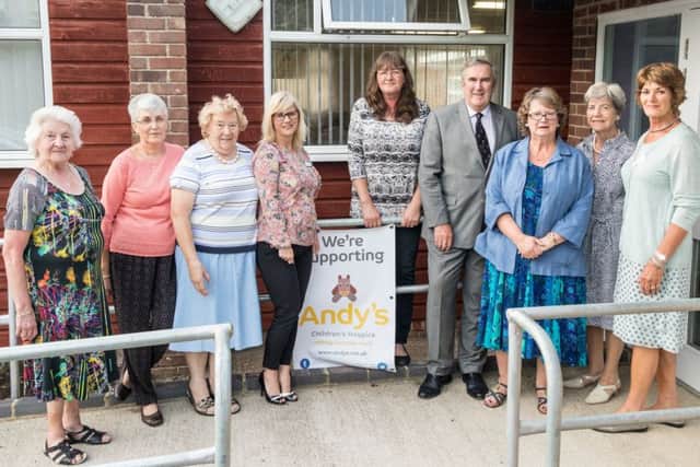 Auithor Gervase Phinn with members of Market Rasen Friends of Andy's Children's Hospice EMN-170726-085338001