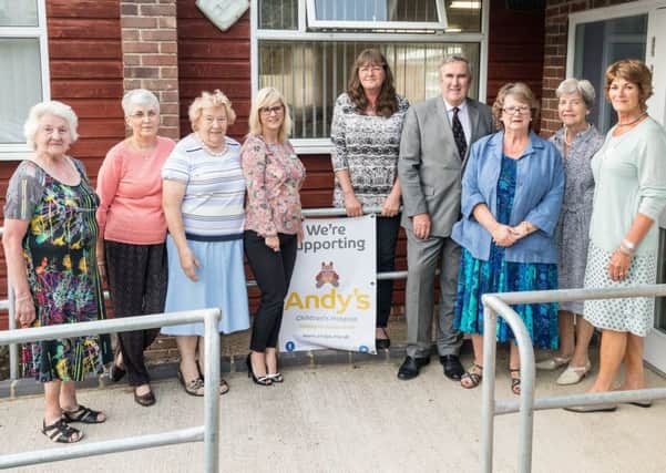 Auithor Gervase Phinn with members of Market Rasen Friends of Andy's Children's Hospice EMN-170726-085338001