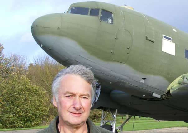 Chairman of the Friends of Metheringham Airfield Andy Marson and the Dakota. EMN-170108-131958001
