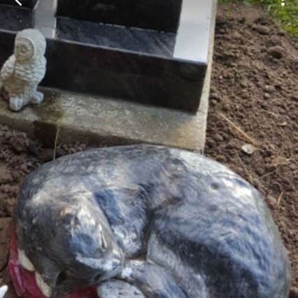 The hand-painted cat ornament stolen from a grave in Sleaford Cemetery