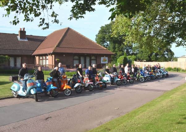Members of the Lost and Lonely Scooter Club have raised more than Â£2,200 for Lindsey Lodge Hospice EMN-170308-173021001