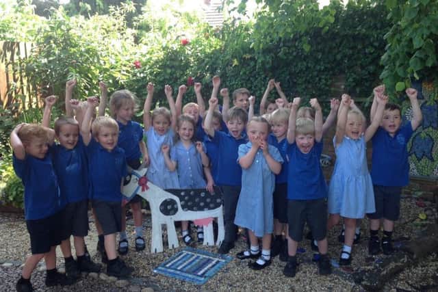 Caythorpe School pupils celebrate their Lottery grant. EMN-170814-140656001