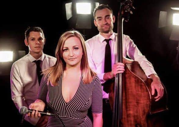 Emilys Trio has recently been set up and are playing all across London. Emily Farrar (centre).