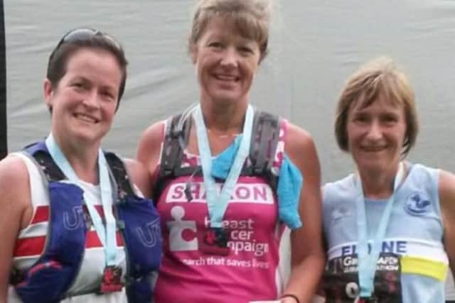 Lisa Harkness (left), Sharon Margarson and Elaine Wilson (right) after completing the Grim Reaper Ultra Marathon EMN-171008-124332002