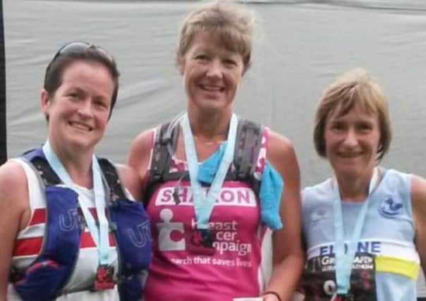 Lisa Harkness (left), Sharon Margarson and Elaine Wilson (right) after completing the Grim Reaper Ultra Marathon EMN-171008-124332002