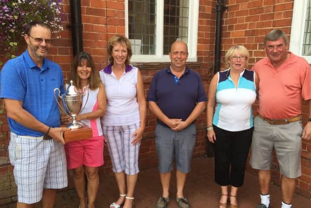 From left, Newton Trophy winners Chris and Polly Hunt, mixed section organisers Robert Wilson, and non-married couple winners Ron Irwin and Wendy Green EMN-170814-102615002