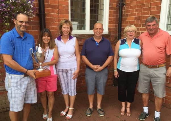 From left, Newton Trophy winners Chris and Polly Hunt, mixed section organisers Robert Wilson, and non-married couple winners Ron Irwin and Wendy Green EMN-170814-102615002