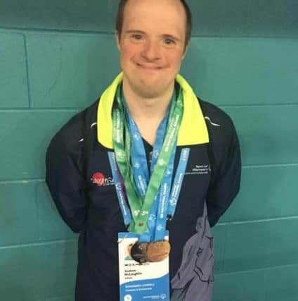 Andrew McLaughlin with his medal haul EMN-170814-225349001