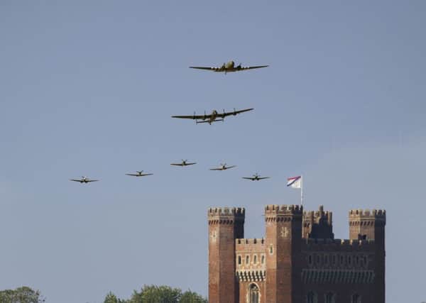 The BBMF end of season formation, comprising the Dakota, Lancaster and five Spitfires, used Tattershall Castle as a landmark on their run in to RAF Coningsby on Sunday. Photo by Oscarpix Imaging. ENGEMN00120130930153422