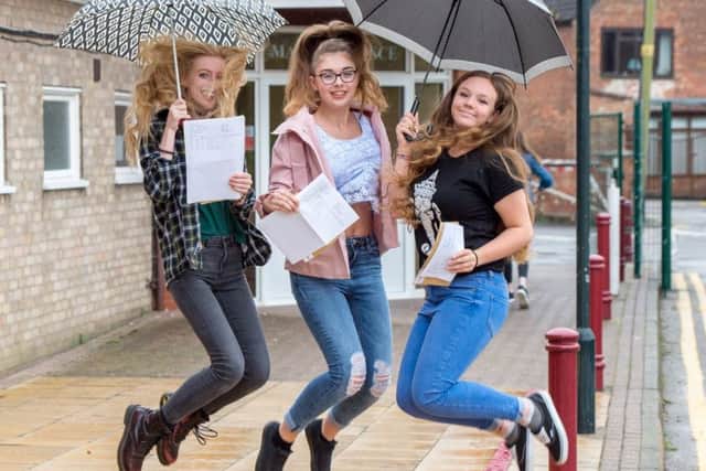 Vicki Simons, Emily Osborne and Kelly Pawson are literally jumping for joy with their results.