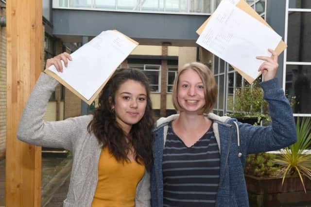 A-Level Results. Kesteven & Sleaford High School. L-R Emma Francis 18 and Phoebe Morgan 18. EMN-170817-105832001
