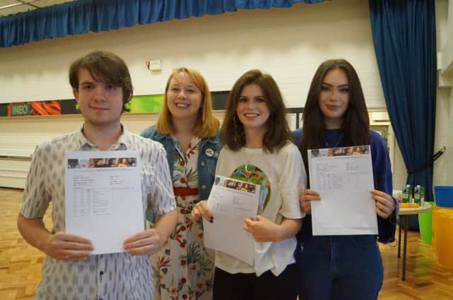 Some of the A-grade English students, with Head of English Sarah Peacock. From left: Adam Newton (A, A*, B, B) heads to Lincoln to study Histroy; Laurel Kavanagh (A*, B, B) to Leicester to study International Relations and Gabrielle Laurens to Liverpool to study English EMN-170817-111558001
