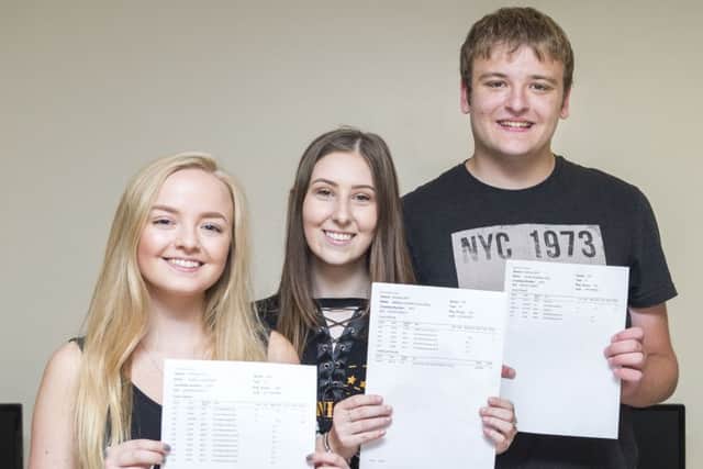 Students Sophie Kelly, Beth Cross and James Veall.
