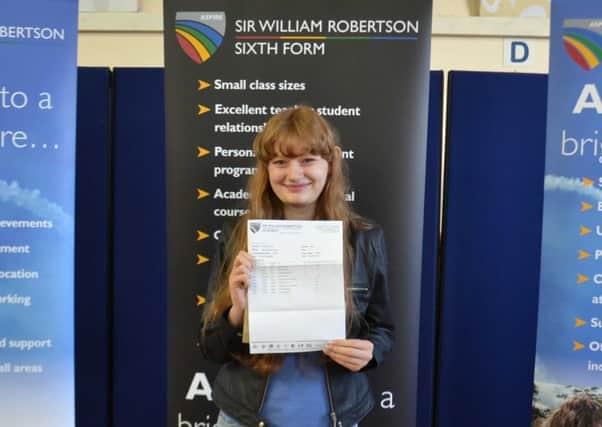 Sophie Corby of Cranwell collects her A level results at Sir William Robertson Academy. EMN-170817-164158001