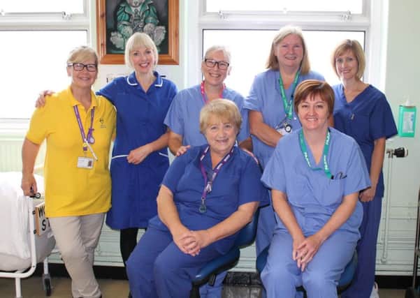 Elizabeth Russell (centre) says her final farewells to her colleagues in the threatre department at Louth Hospital after a dedicated 42 years service.