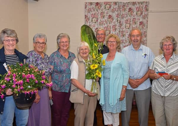 Members of the Barkwith & District Gardeners Association Late Summer Show, pictured with judges and organiser. Photo by John Edwards EMN-170809-143254001