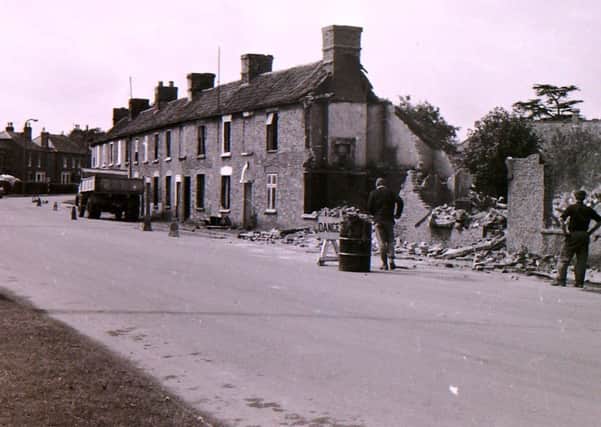 Can you recognise where these houses once stodd on London Road in Sleaford, up until demolition in 1968? EMN-170809-172938001