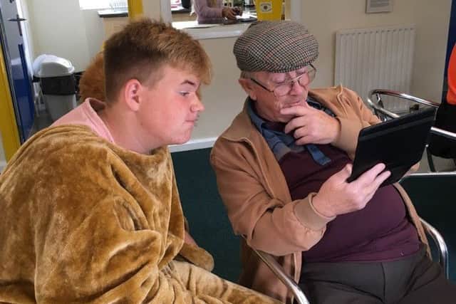 Leo President Luke with one of the grateful techno-training recipients EMN-170918-095004001