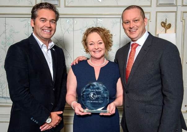 Joyce Morton with Duncan Berry (Bluebird Care's Chief Operating Officer) and Colin Angel from the United Kingdom Homecare Association (UKHCA).