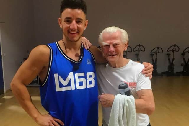 Ron Reynolds (right) with personal trainer Ryan Gray.