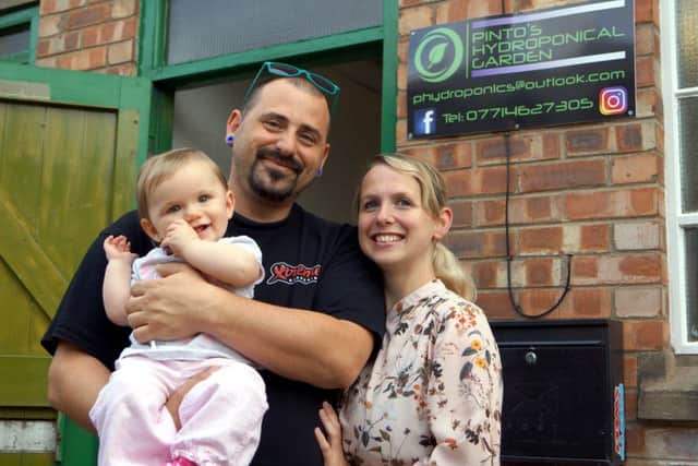 A family affair: Bryan Pinto, his partner Tanya Gardener and their daughter Bryony are looking to a green future. EMN-170919-085303001