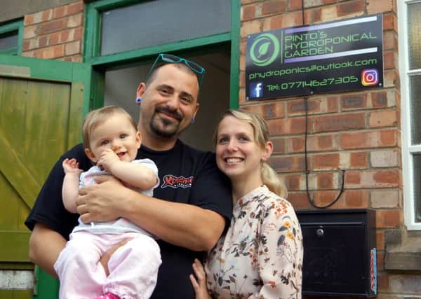 A family affair: Bryan Pinto, his partner Tanya Gardener and their daughter Bryony are looking to a green future. EMN-170919-085303001
