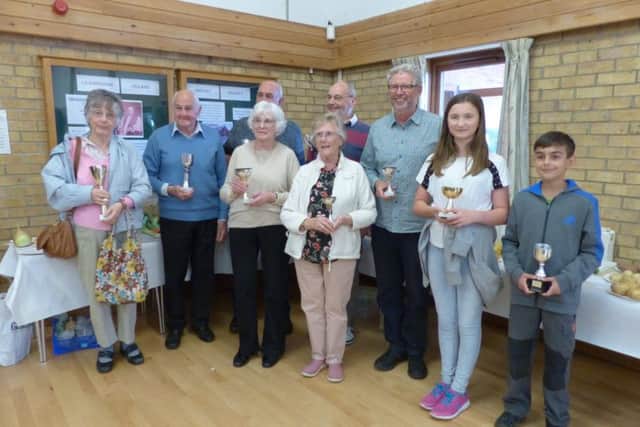 Pictured are winners from each category holding their cups and trophies. EMN-170919-101344001