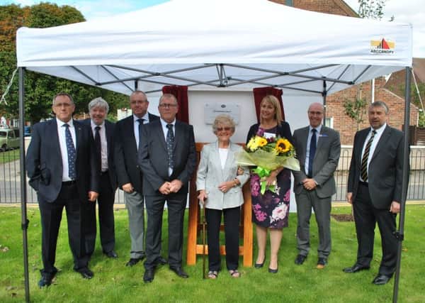 The development is named in memory of the late Ron Chapman. Pictured L-R The Chapman Family, (second from left) LACE Housing Board Member Bon Walder (second from right) LACE Housing Chief Executive Nick Chambers and (far right) Lindum Managing Director, Simon Gregory