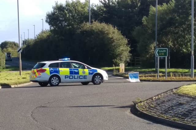 Police closed the road between the two roundabouts.