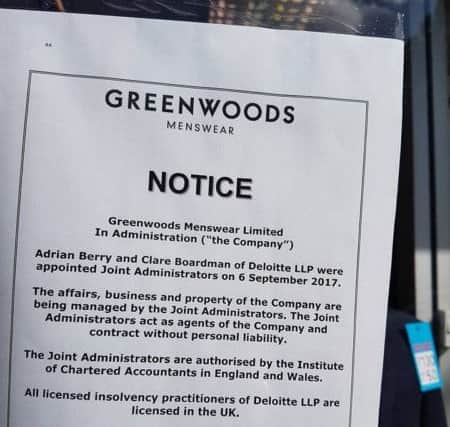 The notice announcing Greenwoods menswear and suit hire retailer has gone into administration. Photo: Barry Robinson. ANL-170914-074852001