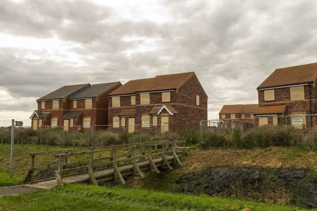The homes in Alford Road, Sutton on Sea have been left unfinished for several years - but now developers say they intend to complete the project in 2018.
