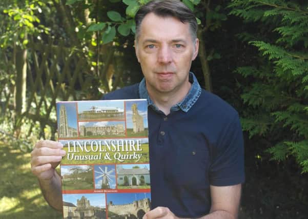 Andrew Beardmore pictured with his new book.