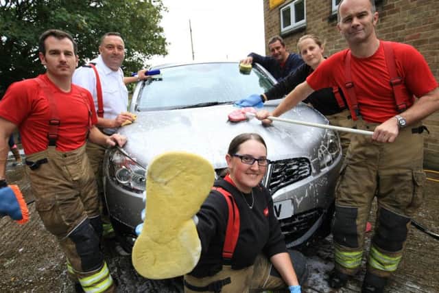 Charity car wash at Metheringham fire station on Saturday September 16th 2017. EMN-170919-122734001