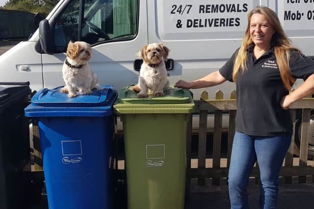 Ruff decisions: Michele Fields with dogs Jim and George. Michele is concerned that the proposed charge might be a strain on the elderly. EMN-170925-094111001