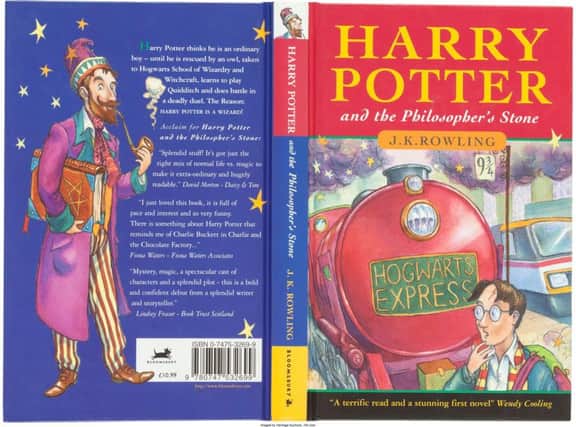 A rare, first-edition Harry Potter book sold at auction for a record-breaking Â£60,000 - more than 5,000 times its original Â£10.99 price tag. SWNS