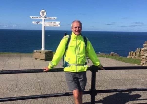 Long-distance walker Tim Fell has made it to Lands End EMN-170110-163458001