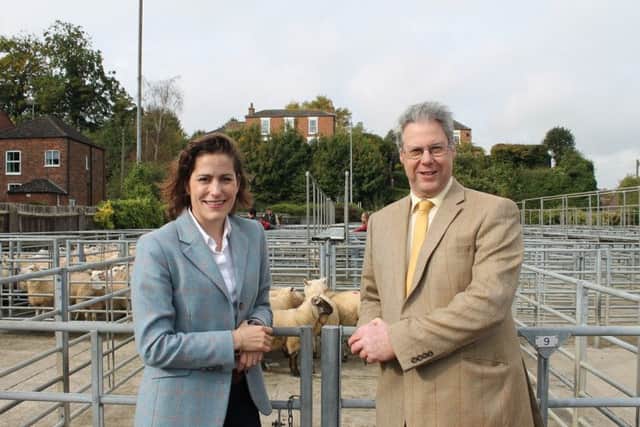 Victoria Atkins MP and Mark Leggott (county chairman of the NFU) at the Louth Cattle Market.