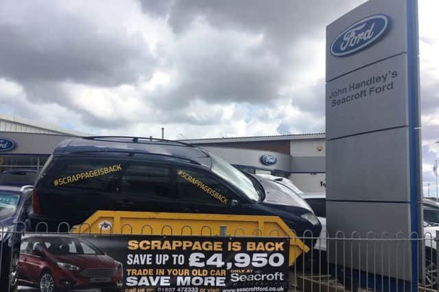 A Mablethorpe car dealership is taking the scrappage scheme literally.
