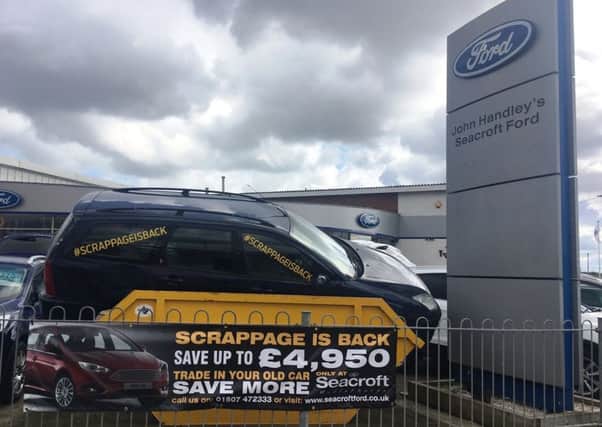 A Mablethorpe car dealership is taking the scrappage scheme literally.