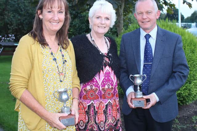 Mixed foursomes winners Elaine and Steve Blyth, with lady captain Fliss Smith (centre) EMN-170925-091705002