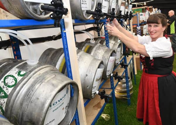 Oktoberfest organised by Sleaford Round Table. Sarah Freeman working behind the bar. EMN-170925-102359001