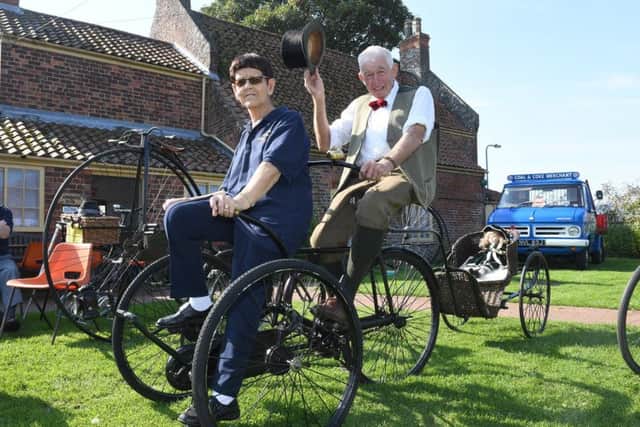 Ann Hammond and Robin Bray, of The Boston Veteran Bicycle Club, pictured on Ann's 1890 Olympia Tandem. EMN-170926-112848001