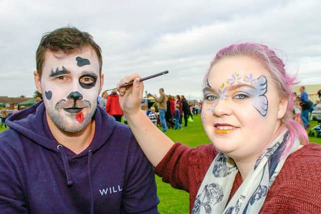 Leigh Taylor, of Lincoln, with Amy Scott-Nicholson, of Potterhanworth, trying out some facepainting