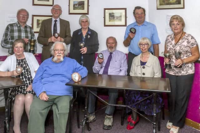 Award winners at the Horncastle & District Photographic Societys annual dinner were: from left, Rita and Roy Leonard, Ron Abbott, Oscar Smedley, Jane Lawrence, Bob Dowlman, Brian Pinnion, Lynn Haith and Sandra Todd.  Photo by Oscarpix Imaging. EMN-170927-110757001