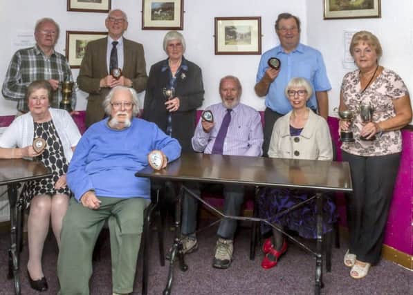 Award winners at the Horncastle & District Photographic Societys annual dinner were: from left, Rita and Roy Leonard, Ron Abbott, Oscar Smedley, Jane Lawrence, Bob Dowlman, Brian Pinnion, Lynn Haith and Sandra Todd.  Photo by Oscarpix Imaging. EMN-170927-110757001