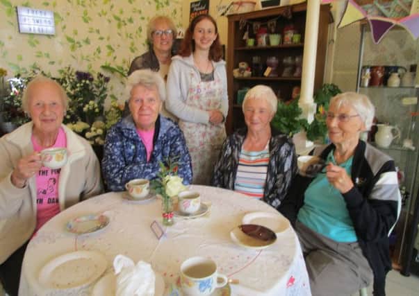 Ladies enjoying coffee and cake as part of The Worlds Biggest Coffee Morning, at Snapdragons Florist, in Burgh le Marsh. EMN-170929-164052001