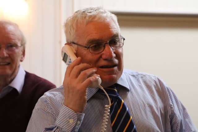 Alan Humphries, chairman of the Harmston Memorial Hall Trustees, sending and receiving the message of peace. EMN-170929-234938001
